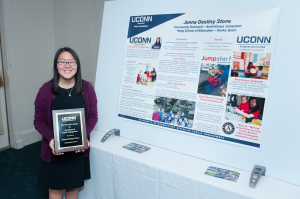 Jenna Stone with her award during the 2017 Provost's Award for Public Engagement ceremony.